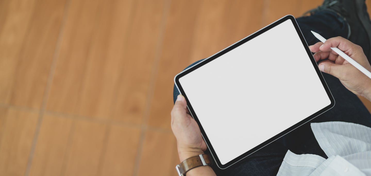 Person Holding White Tablet Computer